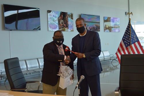 Chairman Anderson receiving the gavel from former Chair Wayne Richards 