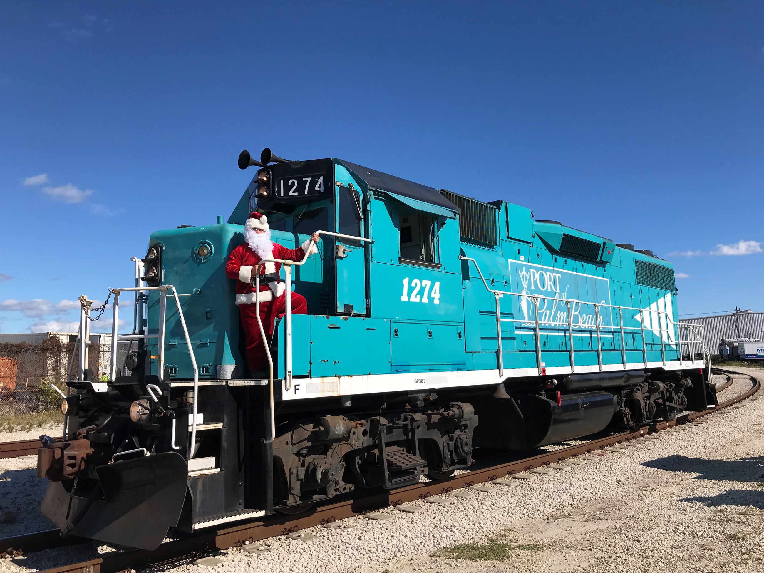 Santa riding on locomotive